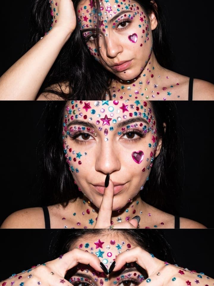 Three stacked flash close-ups of a woman with colorful rhinestones and stars covering her face on black